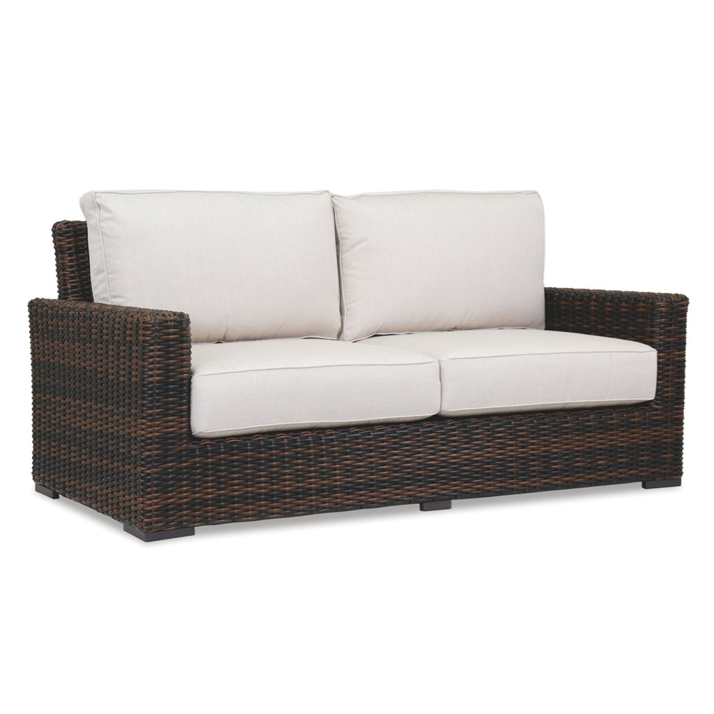 Sunset West Montecito Cognac Wicker Loveseat With Sunbrella Cushions In Canvas Flax - 2501-22